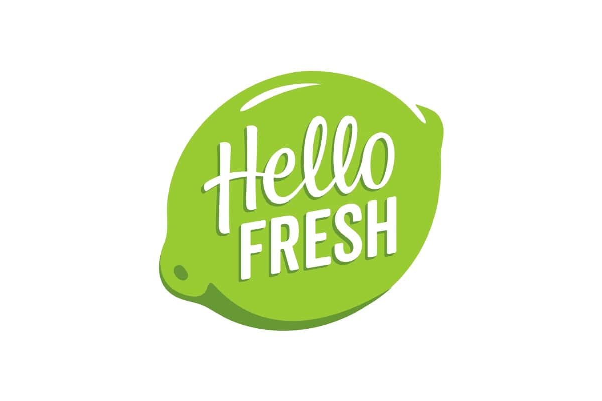 HelloFresh logo featuring white text reading "Hello FRESH" inside a bright green, stylized lime shape on a white backgroundโyour go-to symbol for Exclusive Deals on fresh meal kits.