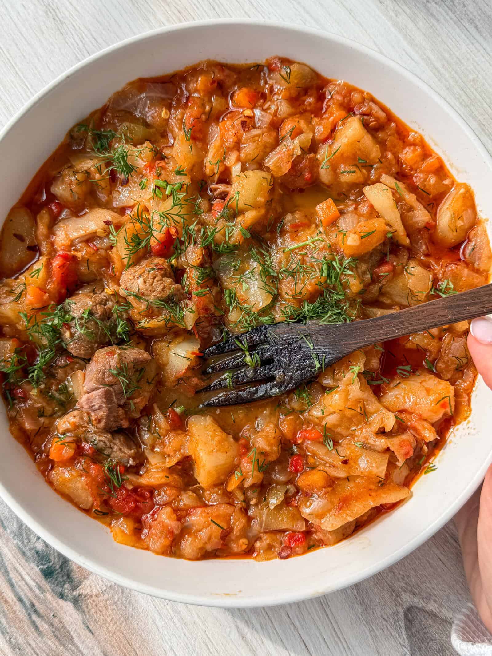 weight loss cabbage stew in a white bowl