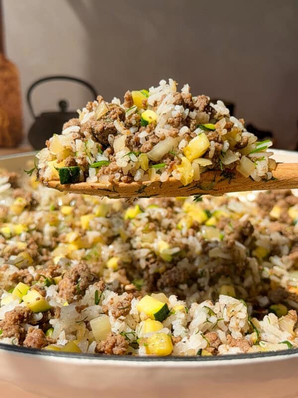 Ground beef rice skillet with zucchini and herbs