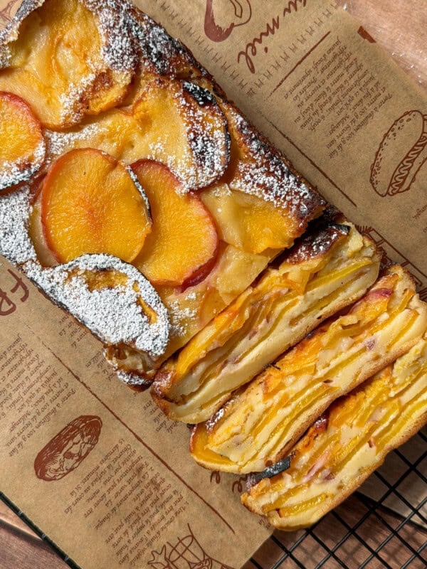 Invisible peach cake on a piece of parchment paper