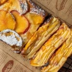 Invisible peach cake on a piece of parchment paper