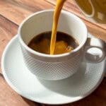 Pumpkin Creamer being poured into white cup