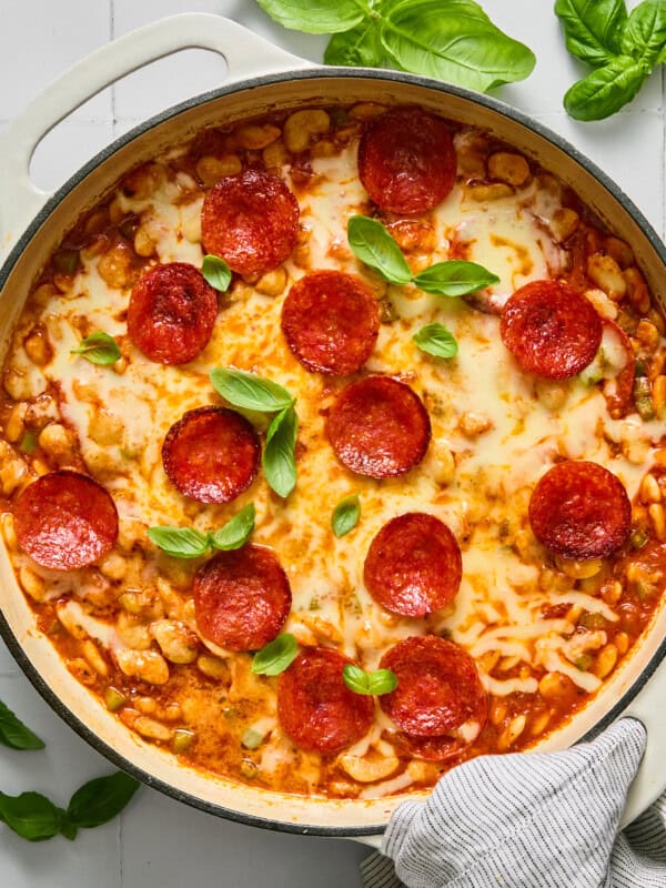 Pepperoni pizza pasta bake in a white skillet
