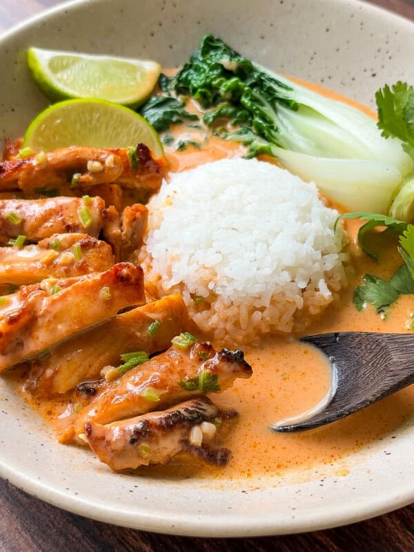 Thai red curry chicken bowl with rice and bok choy