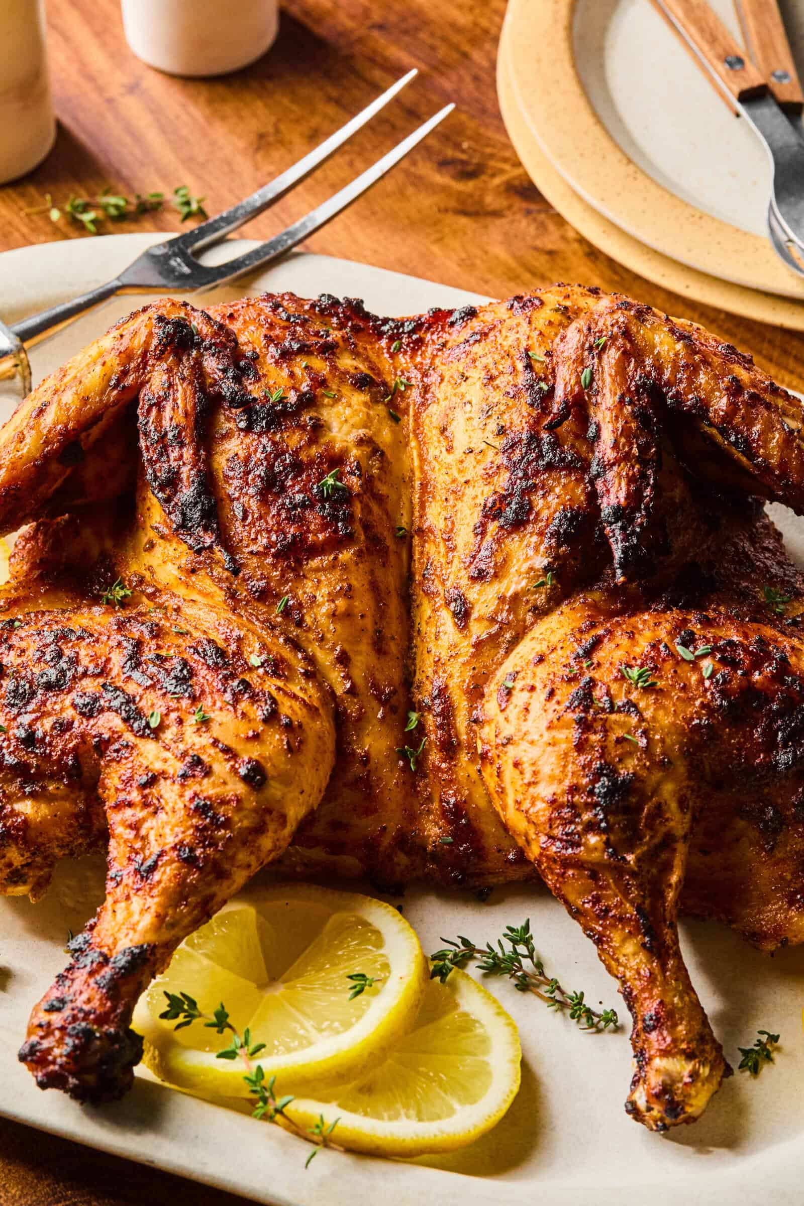 Golden spatchcock roasted chicken with lemon and thyme